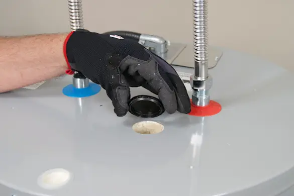 PHOTO: Reinstall the anode rod cap.