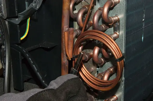 PHOTO: Pull the thermistor out of the evaporator.