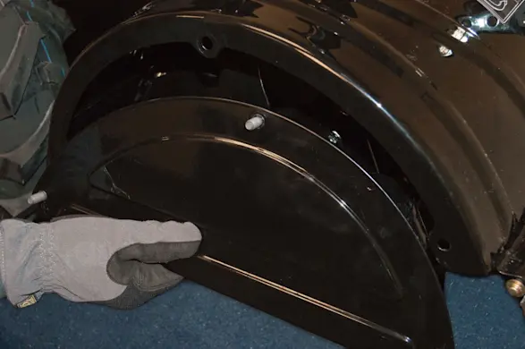 PHOTO: Pull the tine shield end cover off.