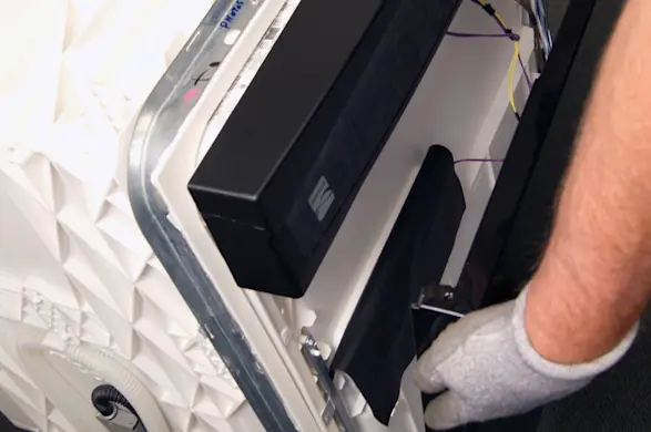 PHOTO: Remove the outer door panel.