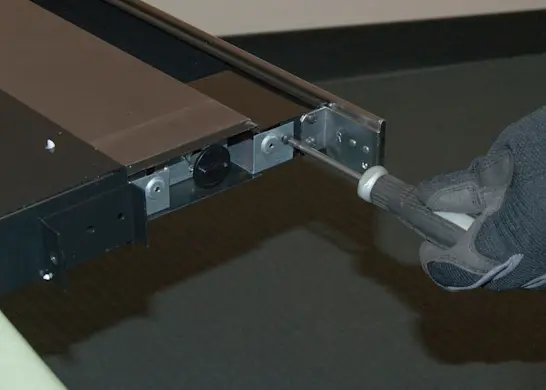 PHOTO: Reinstall the fan switch bracket.