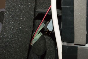 PHOTO: Disconnect the wire harness from the collection bucket float switch.