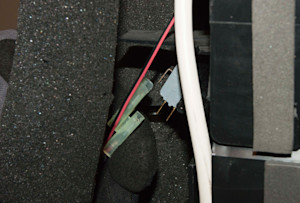 PHOTO: Disconnect the wire harness from the collection bucket float switch.