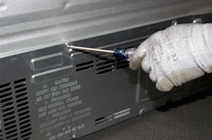 Remove the back panel screws.