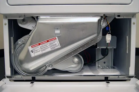 PHOTO: Locate the lint duct assembly below the drum.