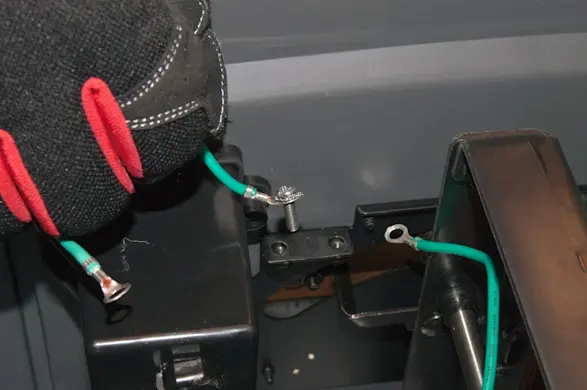 PHOTO: Remove the ground wires.