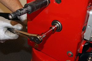 Remove the shaft mounting nut.