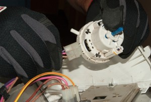 PHOTO: Disconnect the wire harness from the pressure switch.