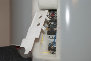 PHOTO: Reinstall the thermostat shield.