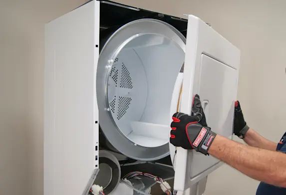 PHOTO: Reinstall the dryer front panel.