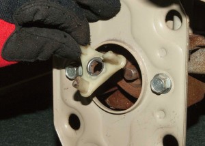 PHOTO: Pull the cog off of the transmission shaft.