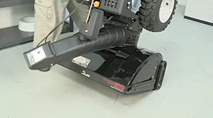PHOTO: Tip the snowblower forward.