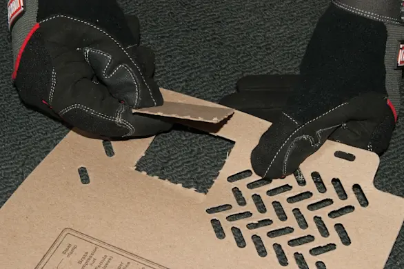 PHOTO: Remove the water valve cutout.