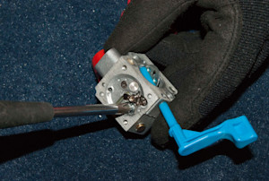 Install the needle and lever.