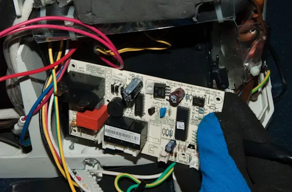PHOTO: Remove the control board.