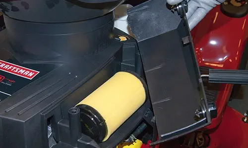 PHOTO: Remove the air filter cover.