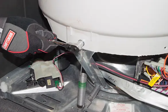 PHOTO: Remove the tub bolt.