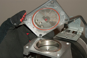 Place the valve plate on the pump.