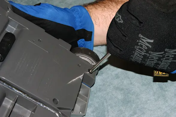 PHOTO: Remove the cover screws.