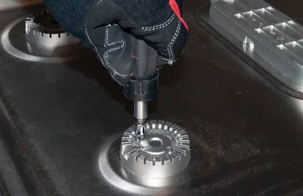 PHOTO: Remove the burner heads.