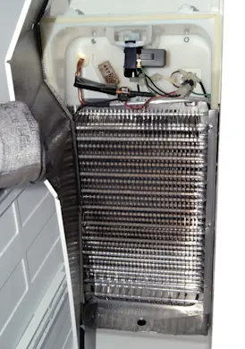 PHOTO: Remove the evaporator panel.