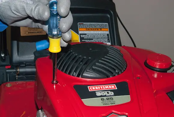 PHOTO: Remove the blower housing screws.