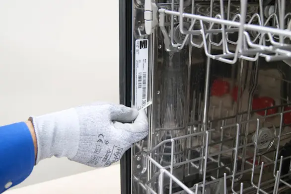 PHOTO: Clean the dishwasher door seal channel.