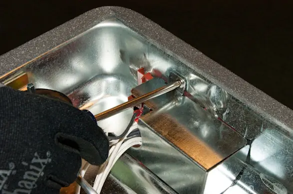 PHOTO: Remove the spark module cover.