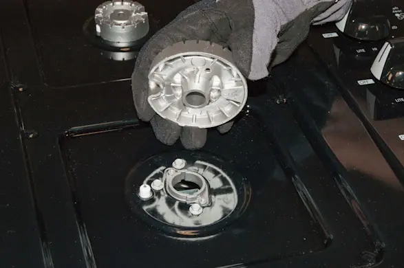 PHOTO: Reinstall the burner heads.