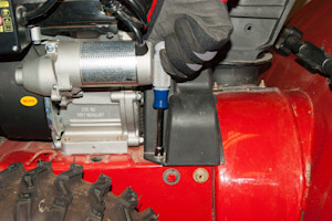 Remove the belt cover bolts.