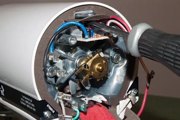 PHOTO: Install the new phase control board.