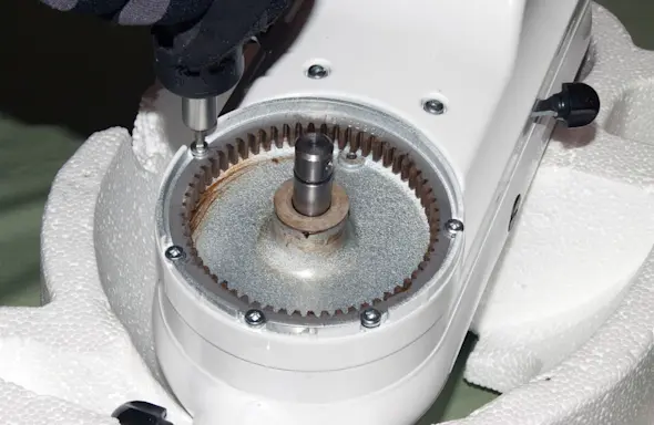 PHOTO: Remove the planetary gear screws.