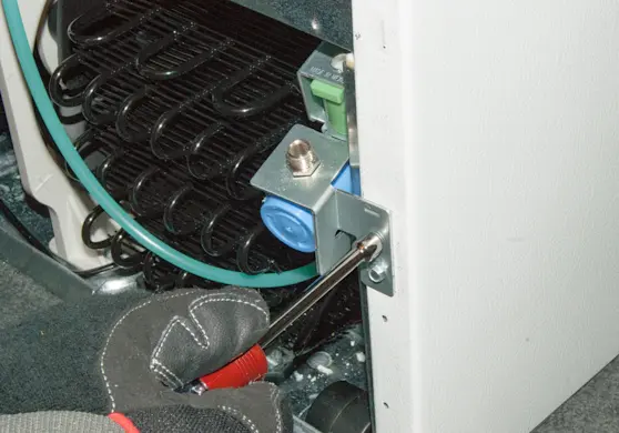 PHOTO: Attach the water inlet valve.