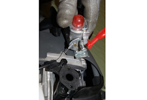 Lift the carburetor off.