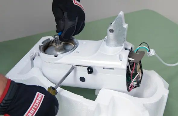 PHOTO: Insert a drift punch through the shaft hole.