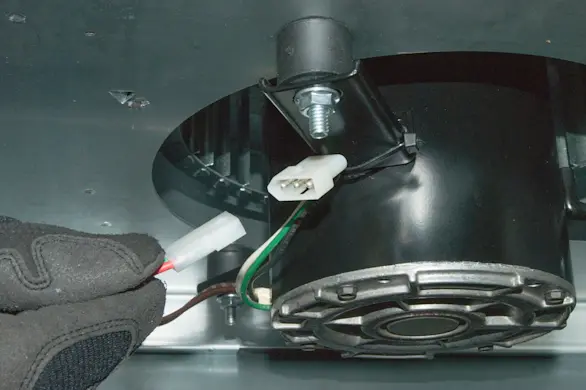 PHOTO: Plug in the motor wire harness.