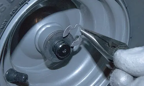 PHOTO: Reinstall the wheel.