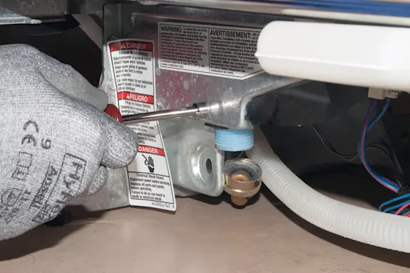 PHOTO: Install the new water inlet valve.