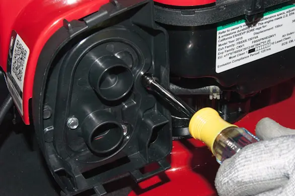 PHOTO: Reinstall the air filter base.