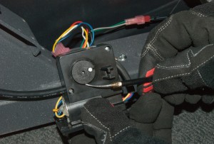 PHOTO: Slide the cable into the motor housing.