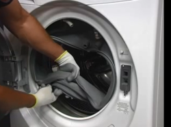 Introduction image for replacing the rubber door boot on a Frigidaire front-load washing machine.