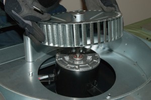 PHOTO: Reinstall the blower wheel blade.