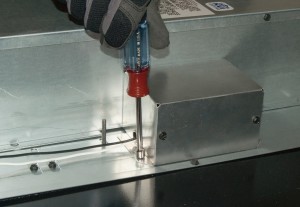PHOTO: Reinstall the gear motor cover screws.