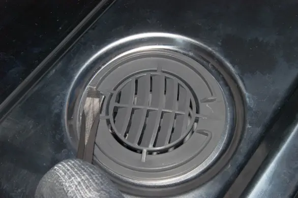 PHOTO: Reinstall the vent grill.