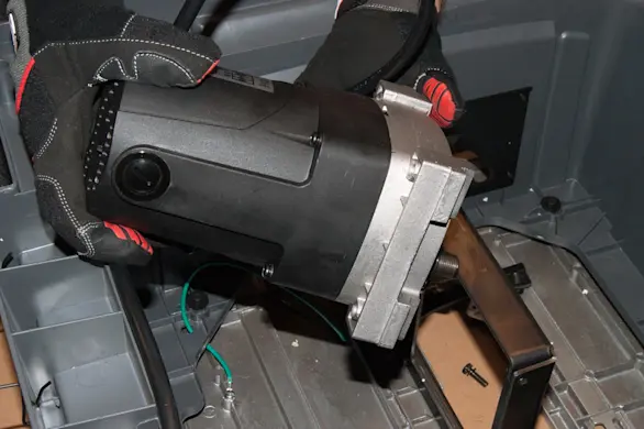 PHOTO: Reinstall the motor.