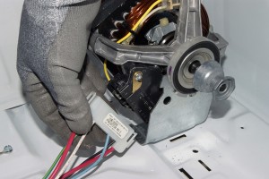 PHOTO: Remove the wires from the drive motor.