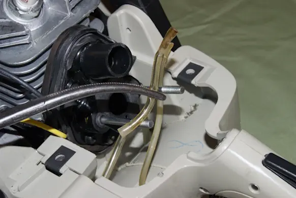 PHOTO: Pull the fuel lines out of the gas tank.