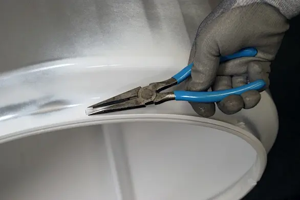 PHOTO: Release the glide bearing clips.