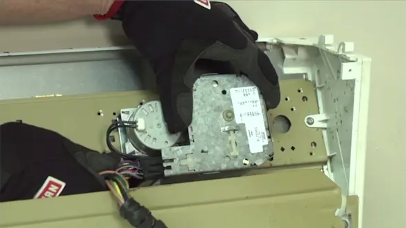 PHOTO: Unplug the timer wire harness.