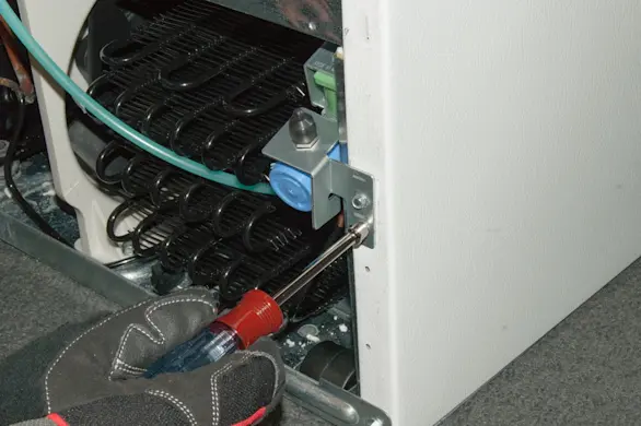 PHOTO: Attach the water inlet valve.